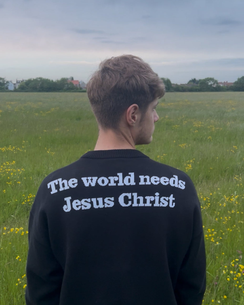 'The World Needs Jesus Christ' Black Sweatshirt
